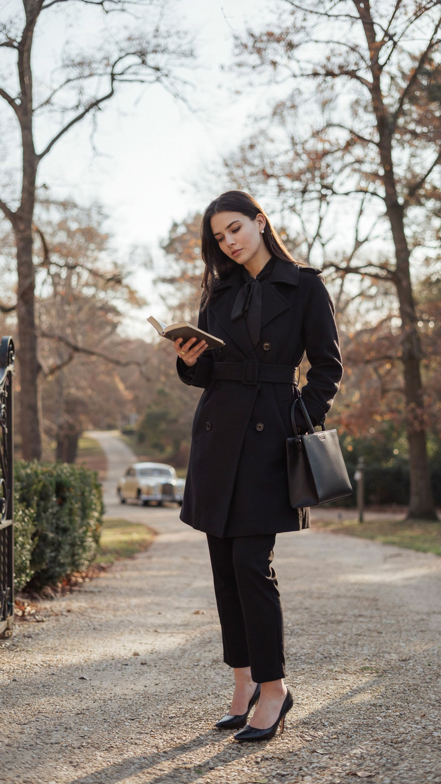 Monochrome black trench coat outfit styled with elegant old money fashion pieces