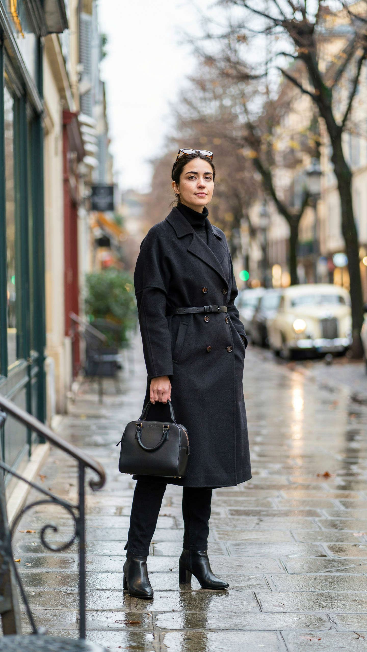 Elegant all black wool coat outfit featuring timeless old money fashion styling